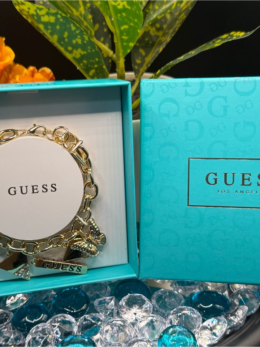 Guess Gold-Tone Charm Bracelet with Butterfly and Logo Charms